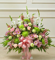 Heartfelt Tribute Pastel Floor Basket Arrangement from Olney's Flowers of Rome in Rome, NY