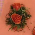 Orange Spray Rose Wristlet Corsage from Olney's Flowers of Rome in Rome, NY