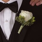 White Rose & Hypericum Boutonniere from Olney's Flowers of Rome in Rome, NY